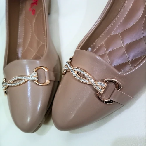 beige buckle pumps